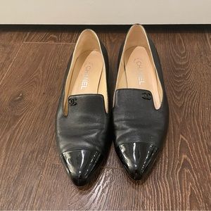 • CHANEL BLACK LEATHER SLIP ON LOAFERS WITH PATENT TOE •